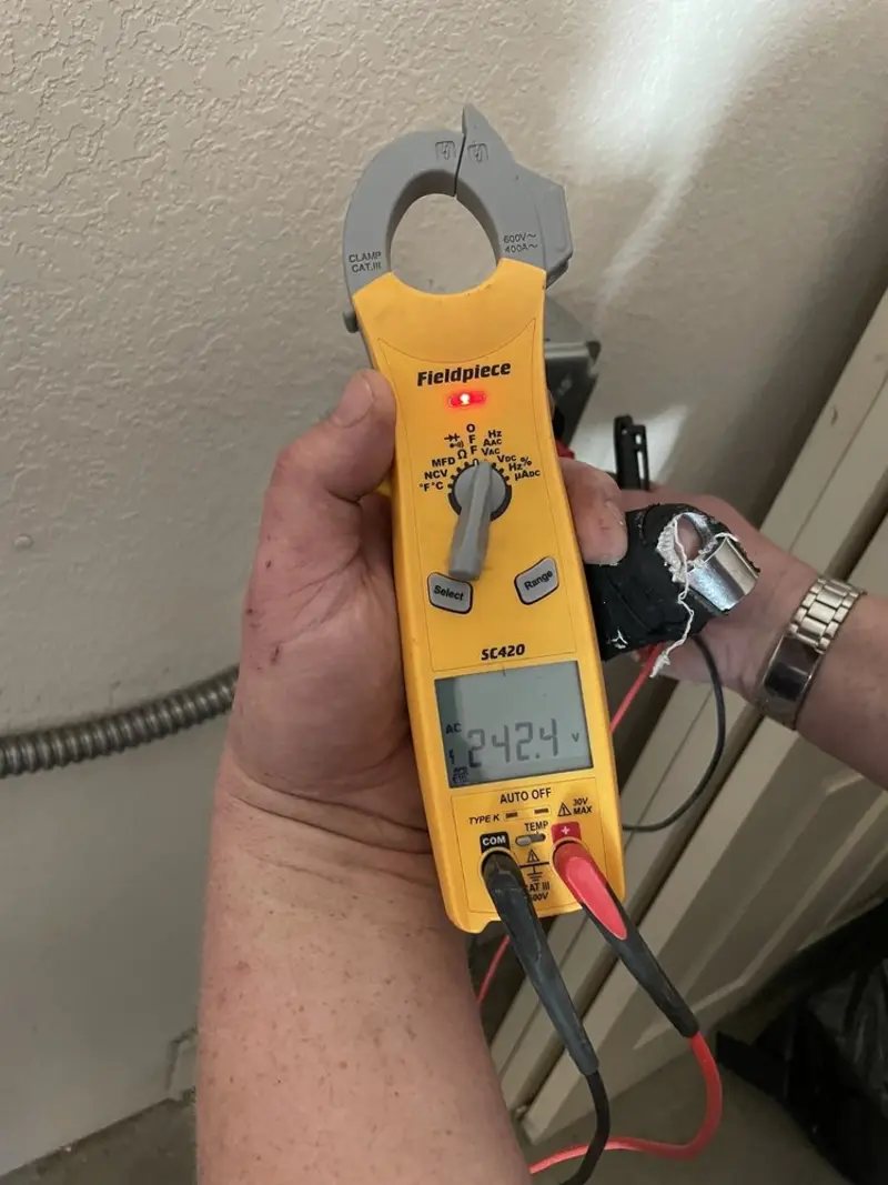 Voltage testing with clamp meter during Generator Installation in Richfield